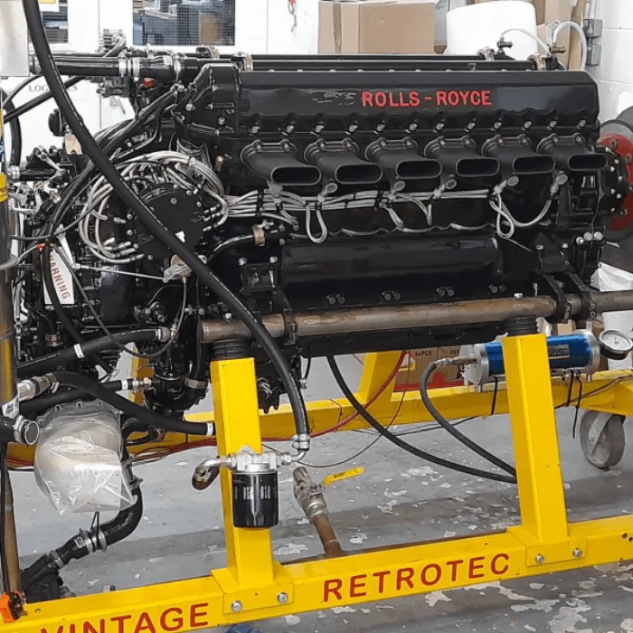 Rolls Royce V12 engine on a workshop stand
